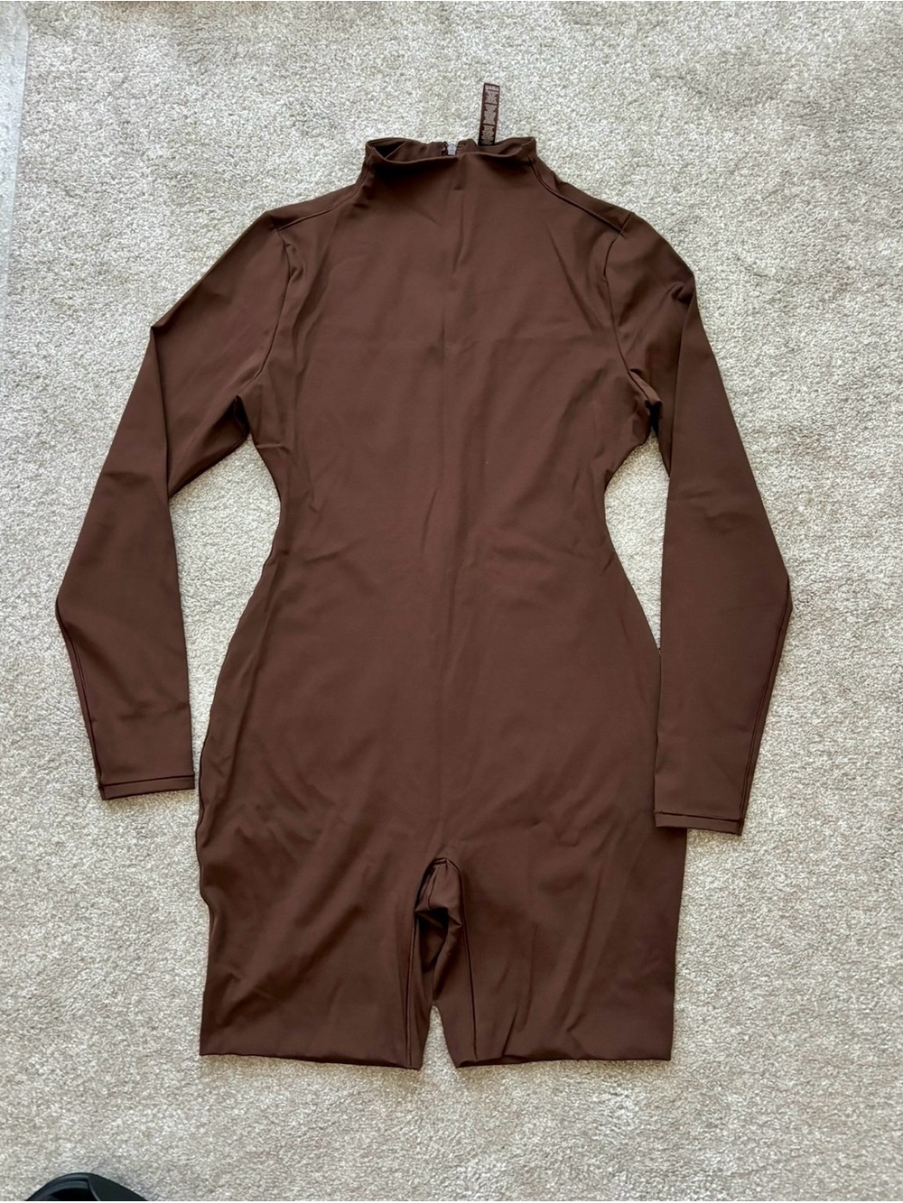 SKIMS ALL-IN-ONE LONG SLEEVE MID
THIGH ONESIE SIZE L - Picture 4 of 4
